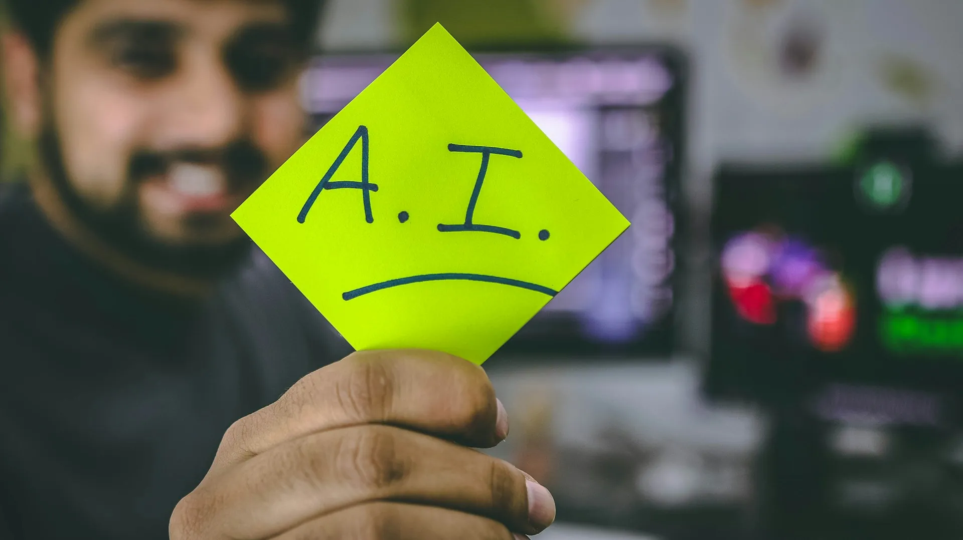 Machine learning engineer workspace with dual monitors: Building Custom AI Chatbots That Customers Actually Trust