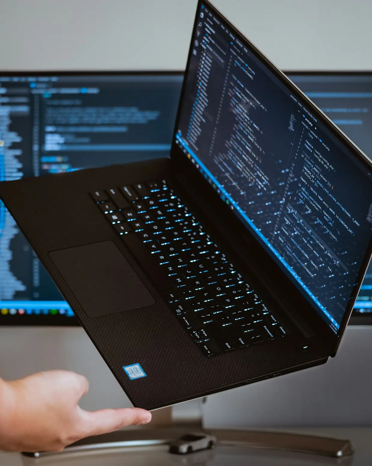 Engineer reviewing terminal output on a laptop
