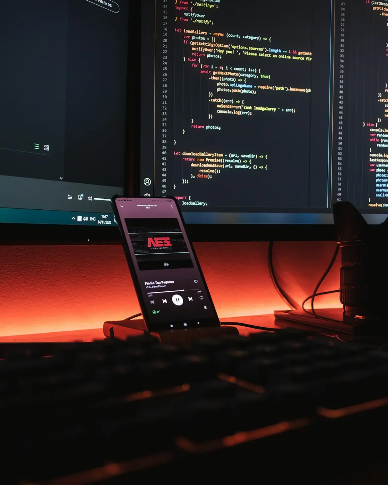 Mobile developer testing an app on a phone