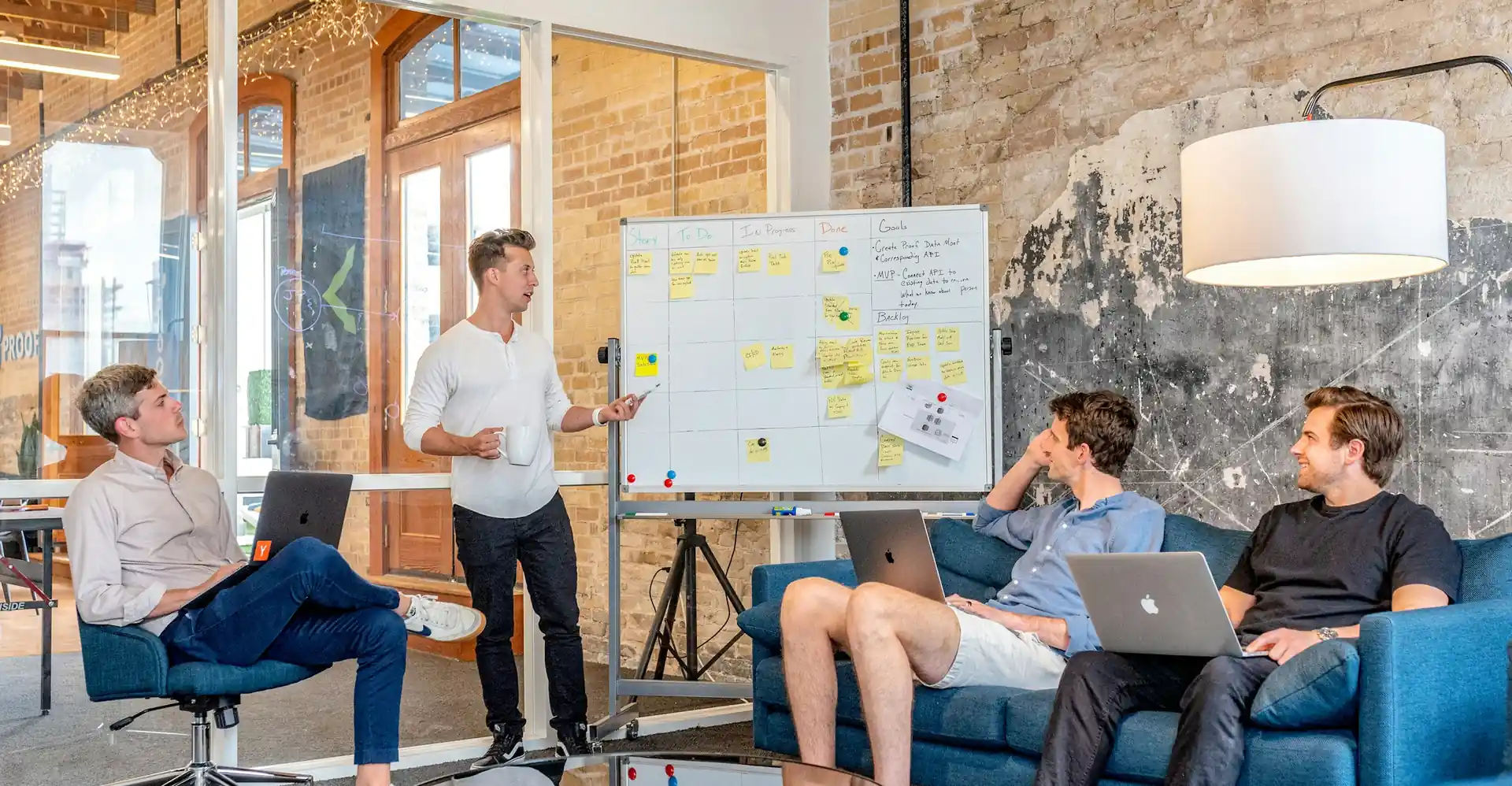 Founding team planning an MVP at a whiteboard
