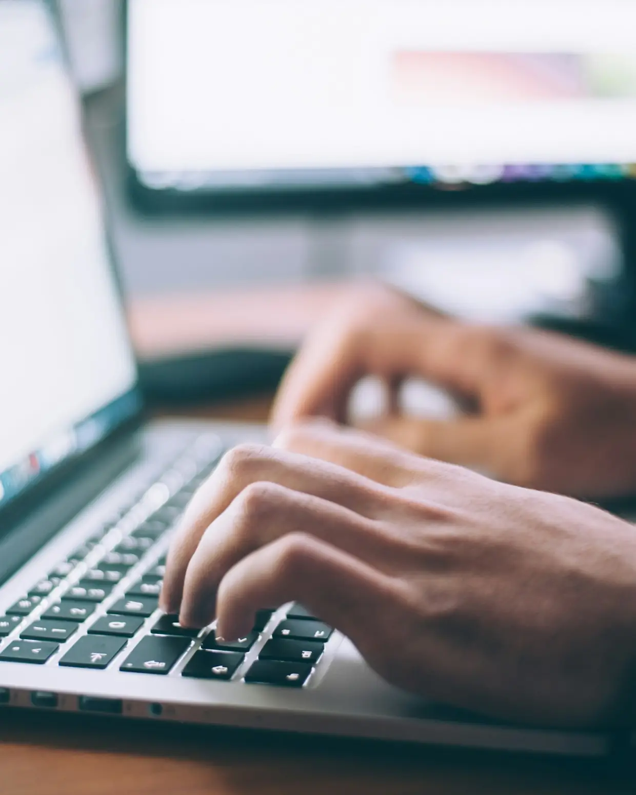 Content editor working on a laptop